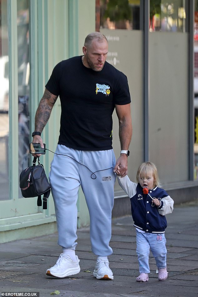 The former rugby player, 39, looked every inch the doting father as he enjoyed some quality time with his little one, 22 months.