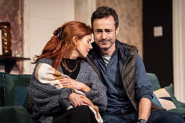 Former Holby City star Joe McFadden plays Sam and in a production shot, he can be seen cradling Stacey in his arms.