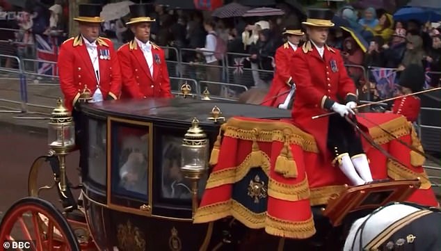 As they traveled through The Mall, the family's view was restricted by condensation on the carriage windows.