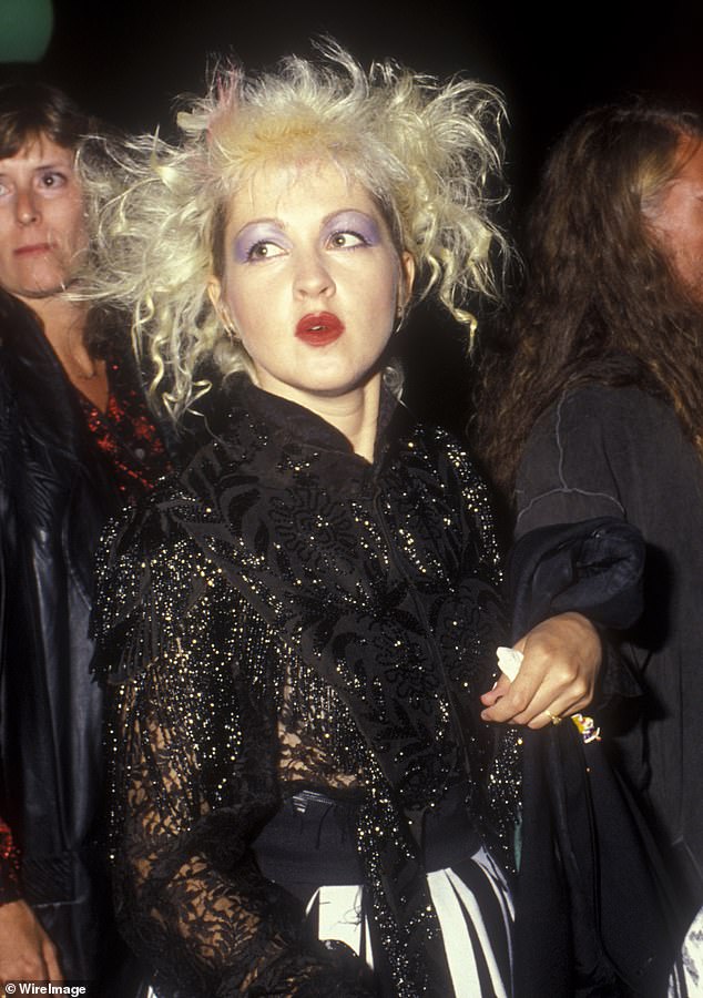 He had previously credited Madonna for inspiring his beginnings in his singing career; Lauper photographed in 1987