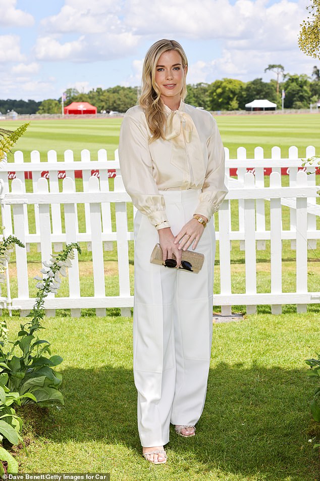 Lady Amelia complemented her twin sister in a white silk shirt and light pants, with gold accessories.