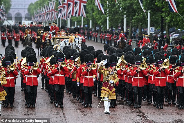 People attend the 'Trooping the Colour' parade marking the official birthday of King Charles III in London on June 15.