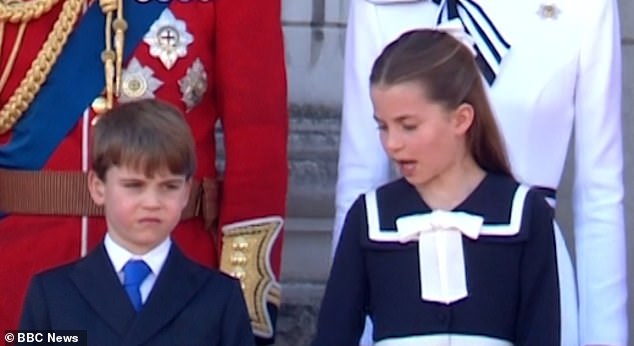 Stern-looking nine-year-old Charlotte realized that her little brother's posture was not up to the scrutiny.