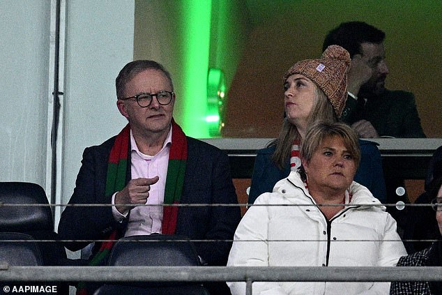 Anthony Albanese has his party room numbers stitched perfectly. Upstairs, he relaxes playing football with his fiancée Jodie Haydon last Friday.