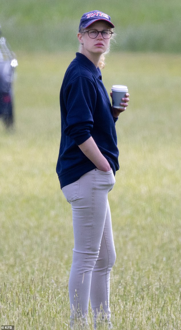 Before the event, Lady Louise, an English literature student at the University of St Andrews in Scotland, was seen wearing a baseball cap and jeans, holding a cup of coffee.