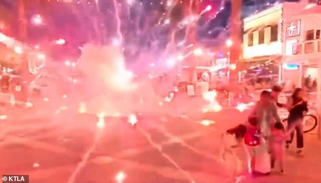 A group of bikers were filmed setting off illegal fireworks in a busy entertainment district in Hermosa Beach over the weekend, nearly hitting several children.