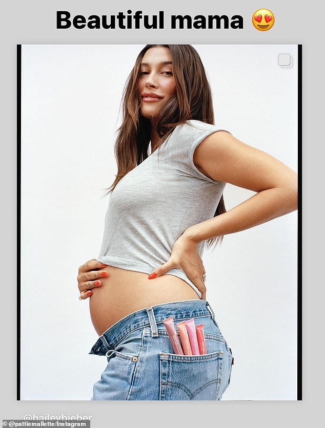 The grandmother-to-be also shared one of Hailey's photos where she poses with her shirt lifted up to show her stomach with the caption: 'Beautiful mom.'