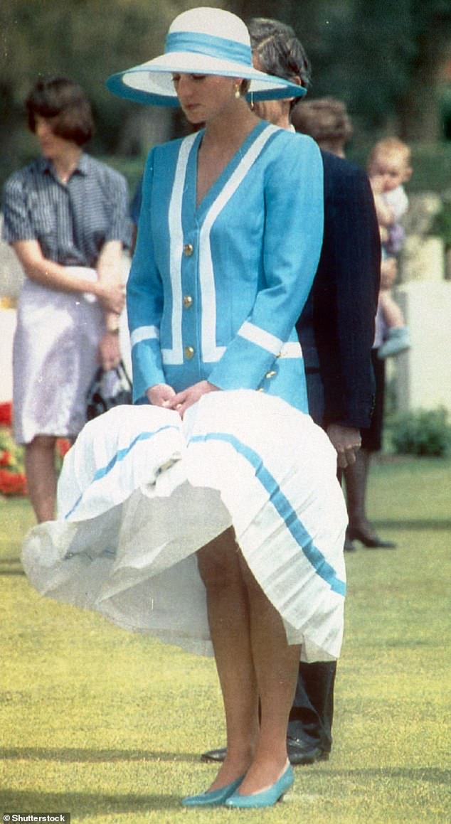 Princess Diana maintains her composure as the wind picks up her hem during a tour of Egypt in 1992.