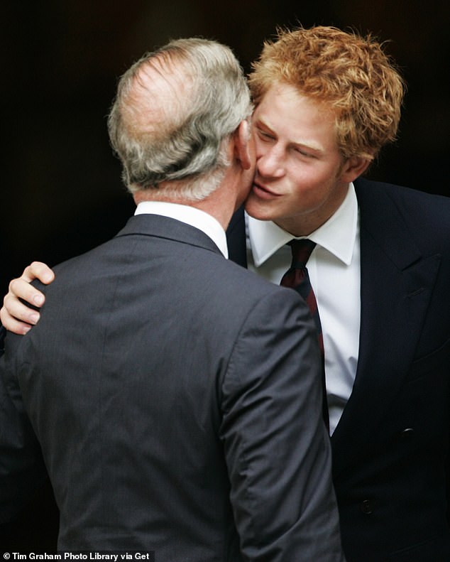 Prince Harry is pictured greeting his father during the 10th birthday memorial service for Diana, Princess of Wales in 2007.