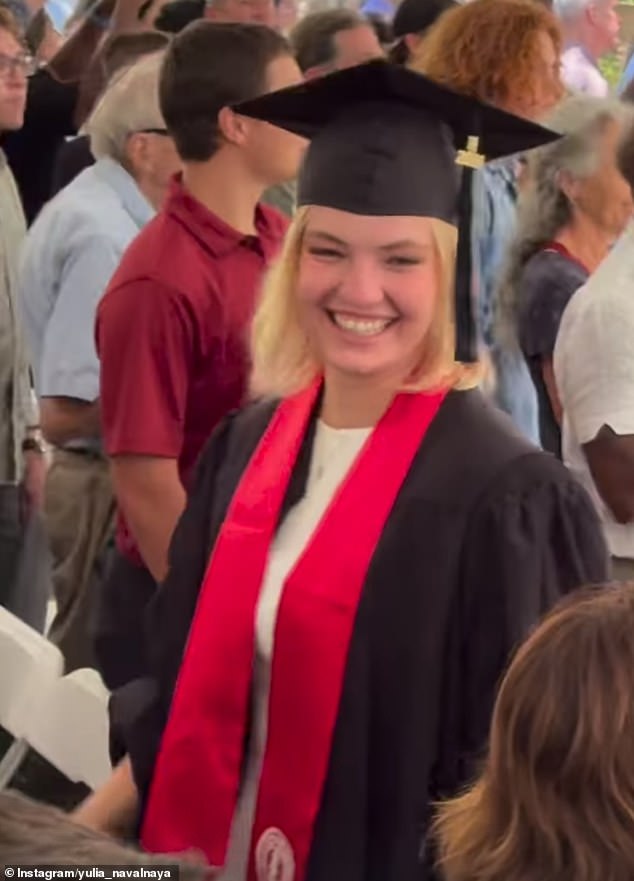 Another clip shows Dasha, dressed in her graduation gown, flashing a smile at her proud mother.