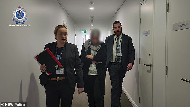 Rachid (centre) was arrested at a unit complex in Kingsgrove on Friday morning.