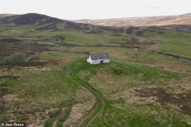 There are two outbuildings attached to the rear of the property: one is used as a log store and coal store, and the other is stone and used for storage.