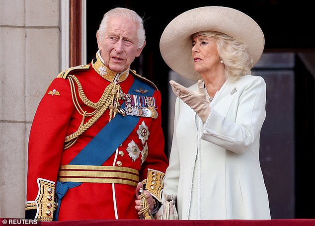 Lip reader Juliet Sullivan says King Charles (pictured with Queen Camilla) commented on the 