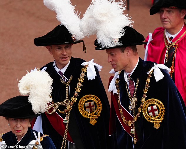 Prince William speaks with Prince Edward as they arrive at the Order of the Garter Service at St George's Chapel at Windsor Castle today.