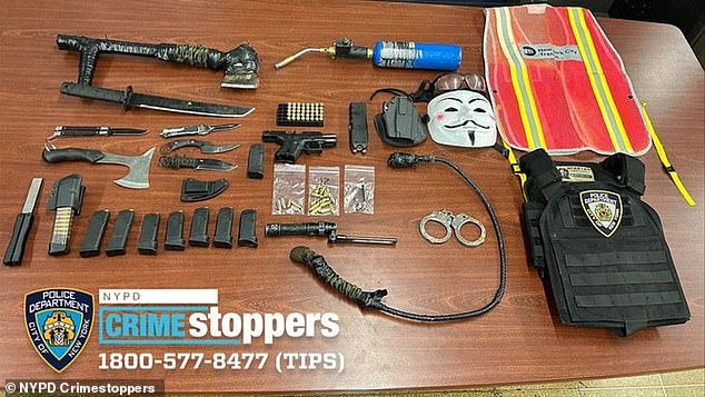 According to police, they discovered a loaded 9mm handgun, ammunition, knives, a machete, a stun gun, a whip, a bulletproof vest with an NYPD patch on the inside, an MTA vest and a baton with disturbing writing.