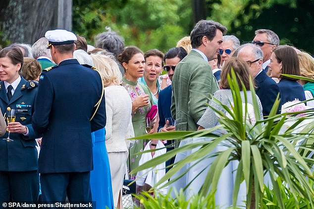 Guests enjoyed a glass of fizz in the sun at Ulriksdal Palace in Solna, Sweden.