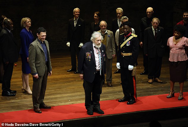 Sir Ian McKellen (centre) bows before the curtain during the evening press presentation of "player kings" at the Noel Coward Theater on April 11