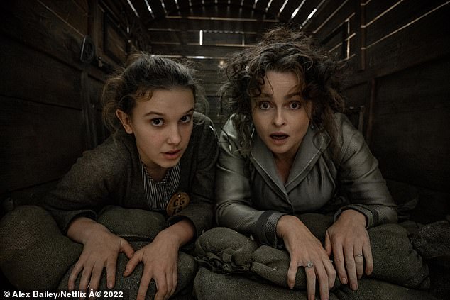 Millie (left) pictured in Enola Holmes 2 with co-star Helena Bonham Carter (right)