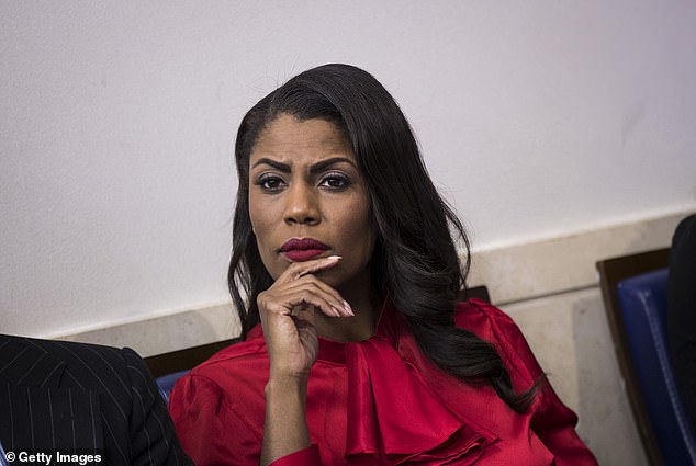 Omarosa is photographed in the White House briefing room in October 2017. Trump said he hired her as a 