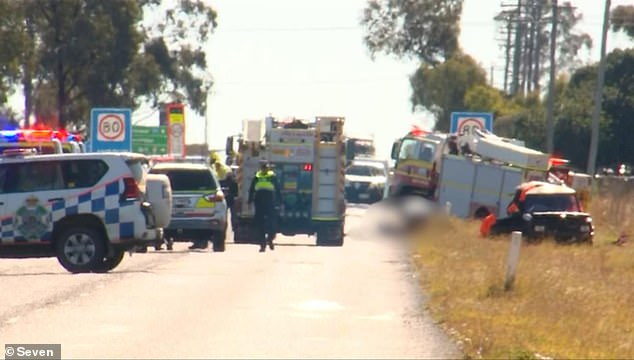 It is now believed the mother had been reversing on the road moments before the accident (pictured, accident scene at Jimbour East, northwest of Toowoomba).