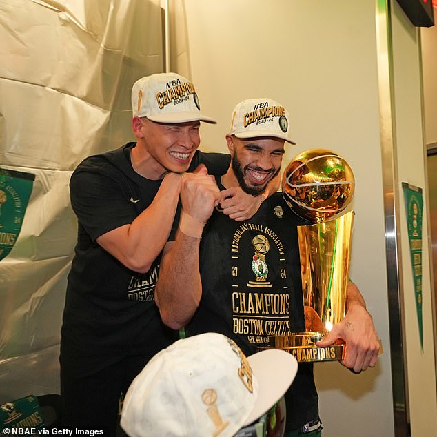 Jayson Tatum came to the locker room with the Larry O'Brien trophy in his hands