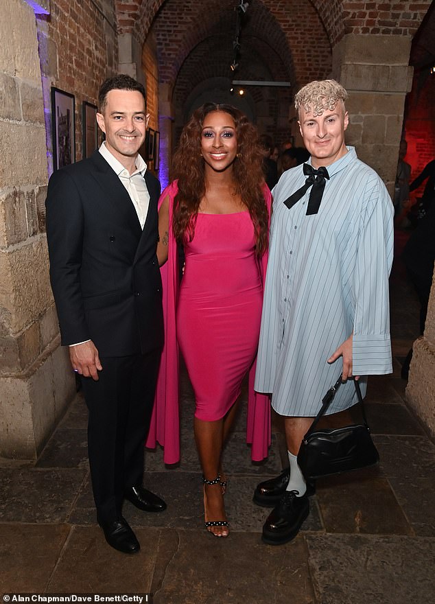 The duo posed for a photo with Carl Mullane.