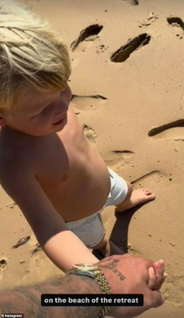 In the video, which was posted on Instagram but appears to have been deleted, one of the Australian influencer's young children wanders along the coast of Tiwi Island in the Northern Territory, where the family is on holiday.