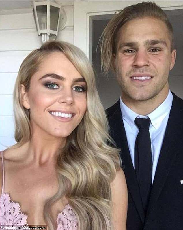 Shawn Adams was flogged by Judge Andrew Haesler for his conduct while investigating allegations that de Belin (pictured with partner Alyce Taylor) had raped a 19-year-old Wollongong woman in 2018.