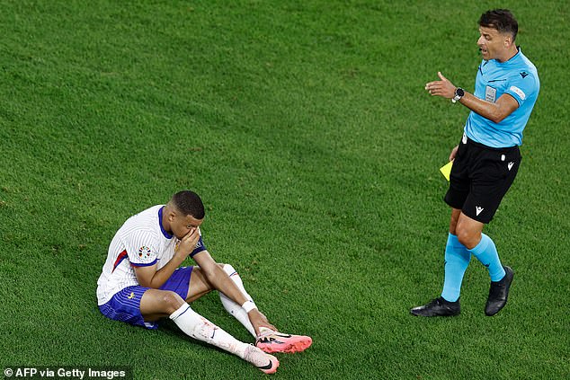 The 25-year-old received a yellow card when trying to stop play to provoke France's substitutions.