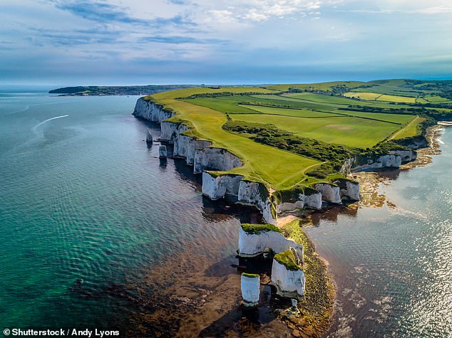 The 95-mile-long Jurassic Coast comes in fourth place. Pictured above is Old Harry Rocks in Dorset, which popularly refers to three chalk formations that mark the easternmost point of the Jurassic Coast.