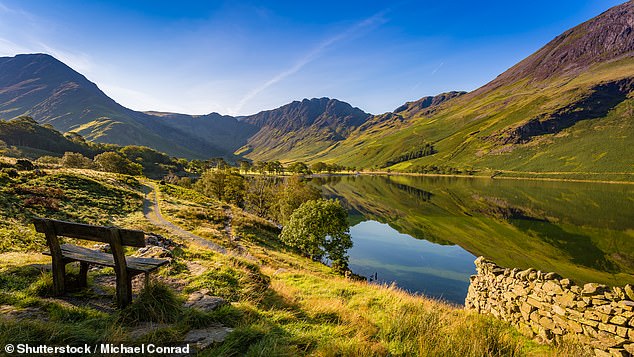 The Lake District's Buttermere Lake (above) and Scafell Pike mountain are joined in seventh place by Durdle Door in Dorset and the view from Stanage Edge in the Peak District.