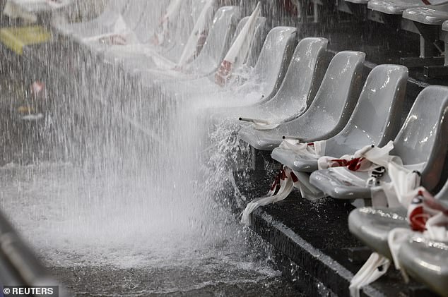 Water cascaded over the terraces and appeared to flood the stands around the ground.