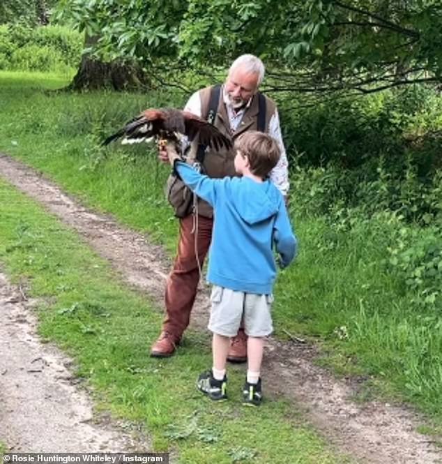 Jack enjoyed his personal falconry lesson while Rosie proudly captured the moment the bird flew away and landed on the young man's arm.