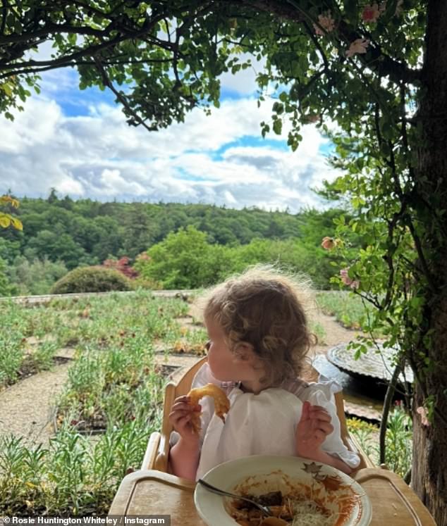 The family enjoyed lunch looking out over the impressive gardens.