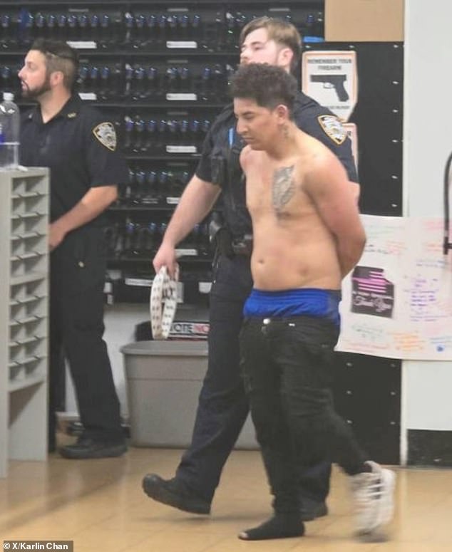 One image showed the shirtless suspect being led away by police wearing only one shoe after the fight with a group of locals.