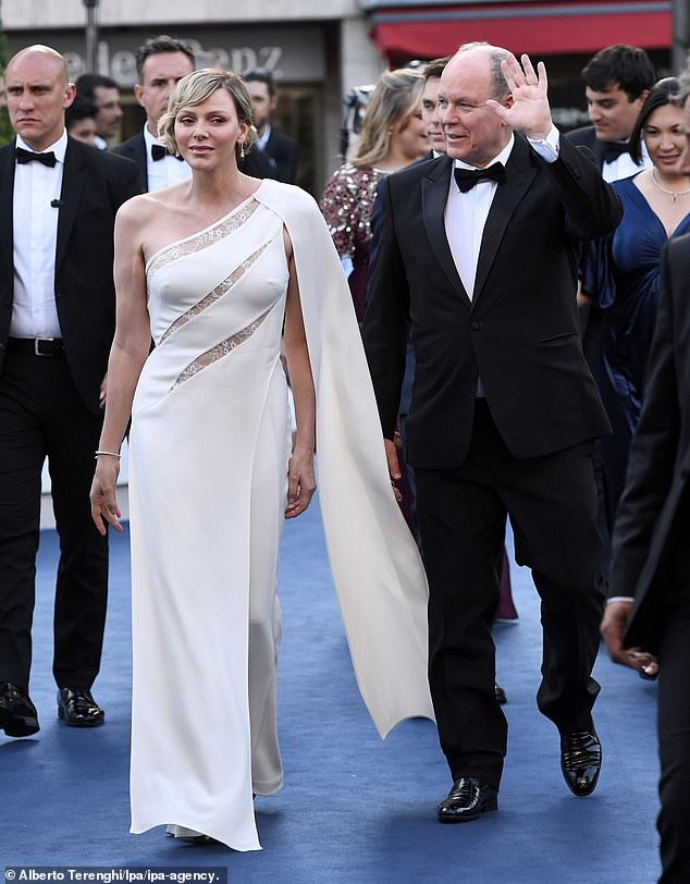 The former Olympic swimmer, 46, stunned in a one-shouldered white ballgown as she stepped out at the festival with her husband, Prince Albert II, 66.