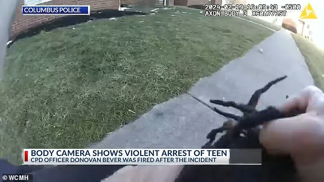 Body camera footage shows him grabbing a 14-year-old boy by the hair and slamming his face into the ground.