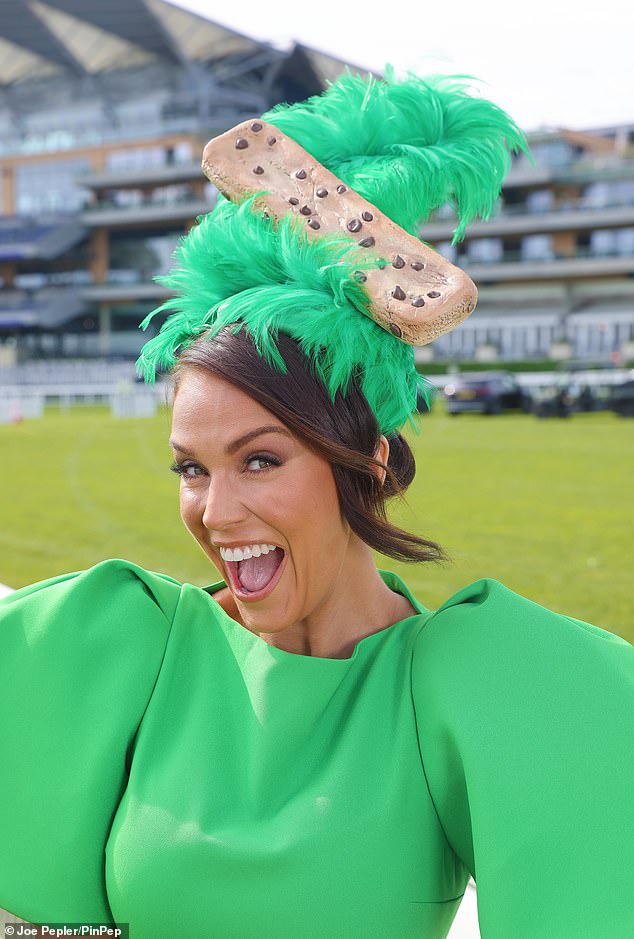 The television personality accessorized her chic green ensemble with an extravagant green headpiece featuring a giant cookie. Novelty hats and headdresses are not permitted in the Royal Enclosure.