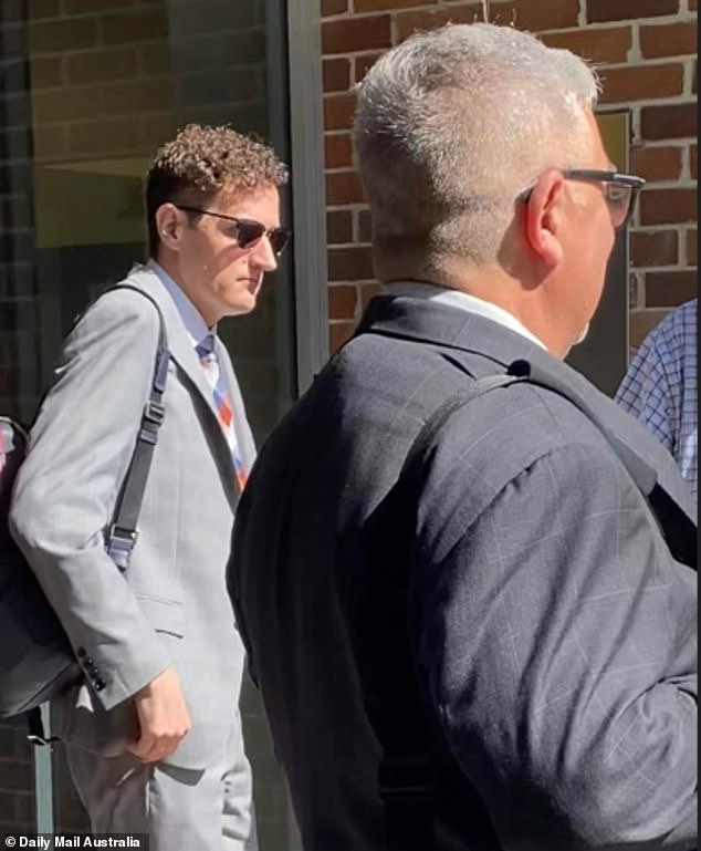 Corbett is photographed leaving court with his lawyer in March 2023.