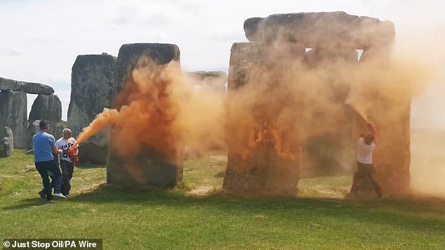 Video footage posted on social media showed two people in white shirts with Just Stop Oil running towards the monoliths with cans spraying paint.