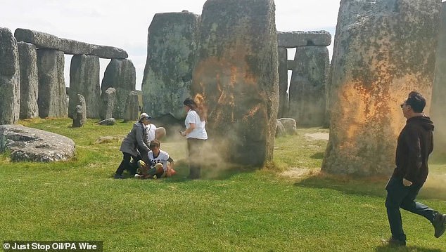 1718799495 310 Just Stop Oil sprays Stonehenge with orange paint as heroic