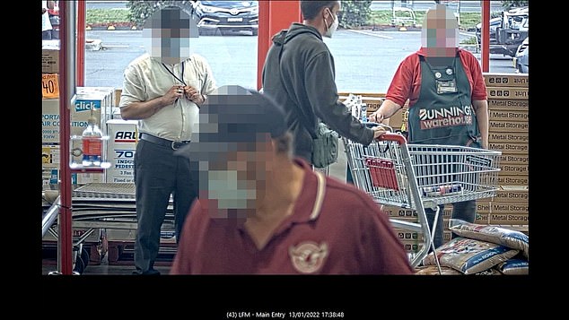 Stein leaves the Bunnings store with the five bags of sand she bought during her visit.