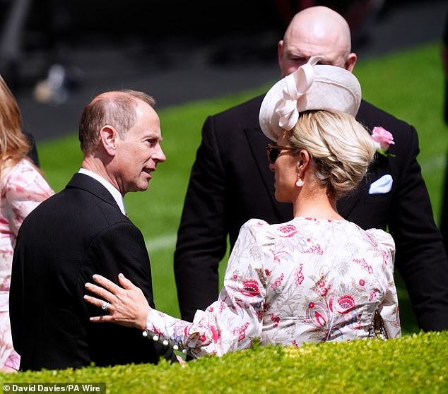 Princess Anne's daughter Zara Tindall seen putting a hand on Prince Edward's arm at the Ascot drinks reception.