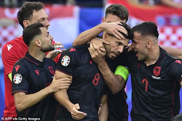 The midfielder's goal kept Albania's hopes of qualifying in a difficult group in the balance.