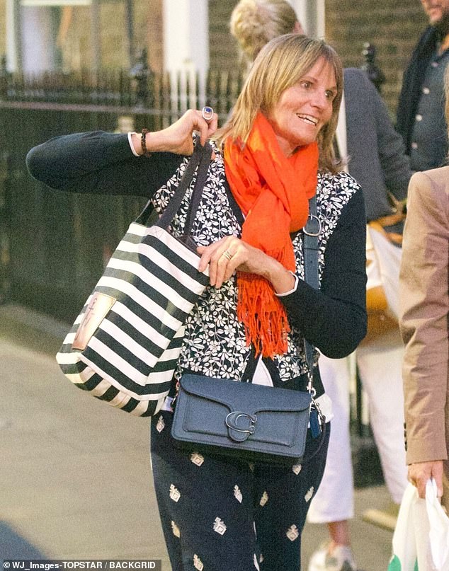 The star cut a relaxed figure in a floral zip-up jacket and contrast printed skirt as she stepped out for lunch with her friend.