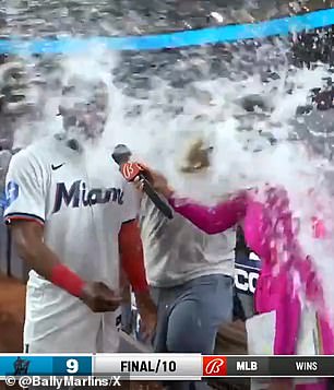 She unexpectedly got soaked just seconds into the interview.