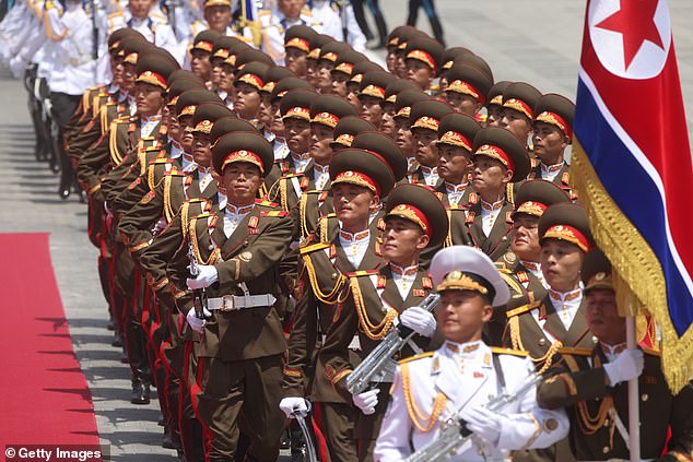 North Korean military officers march during a welcoming ceremony on June 19.