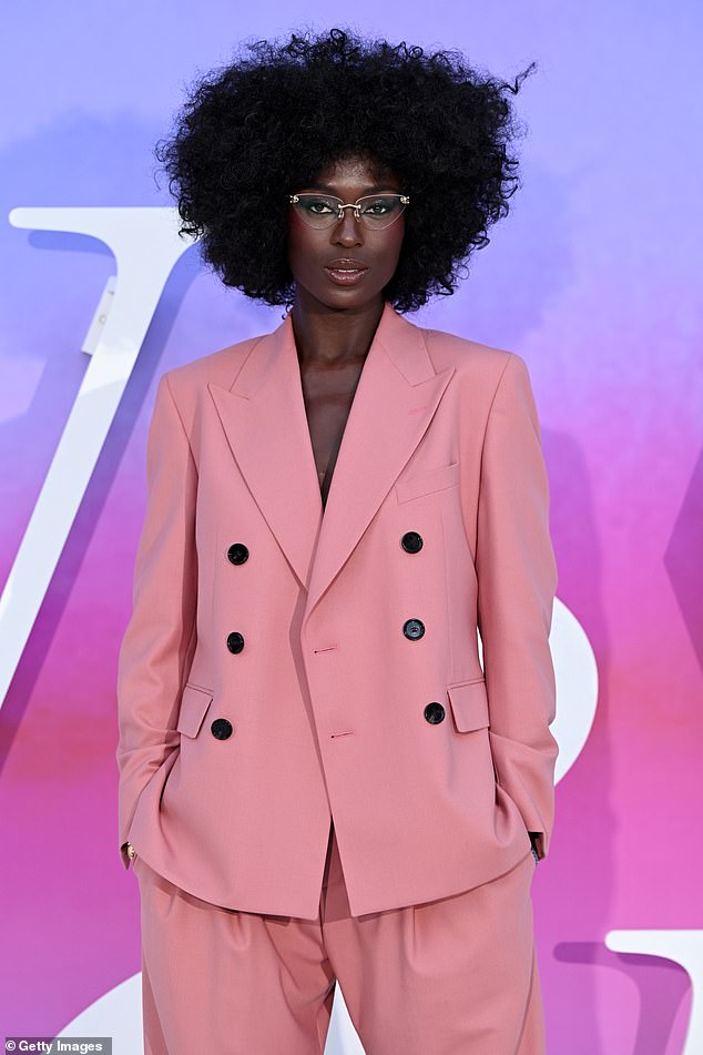 The actress, 37, effortlessly turned heads as she arrived at the event in a pink jacket with black buttons and matching pants.