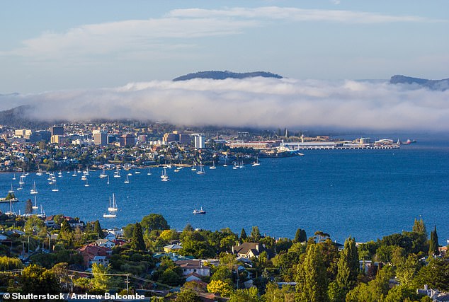 The men had been walking along the Hobart promenade before falling into the water and drowning (pictured in Hobart).