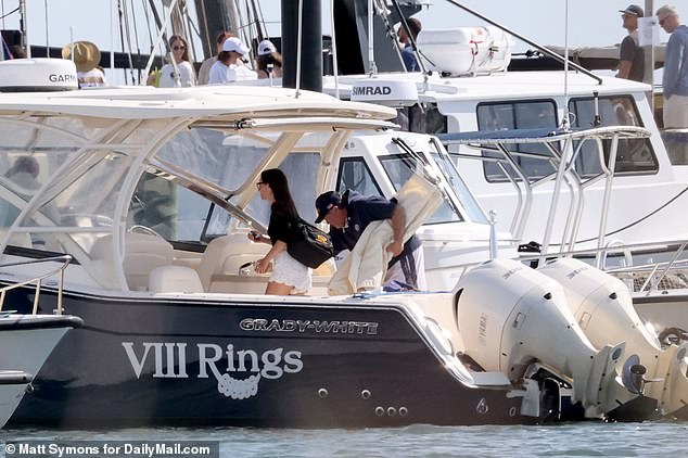 The pair boarded Belichick's motorboat, VIII Rings, aptly named for his eight Super Bowls.